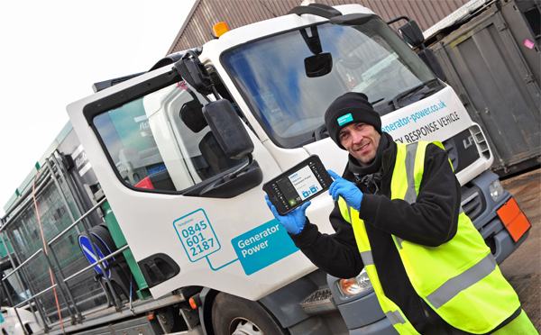 Generator Power employee holding a BigChange mobile device